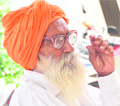 Surjeet Singh (85) who has made a cremation ground his home. 