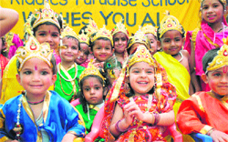 Children in a jubilant mood at a Janamashtami function at Kiddies Paradise School, Ludhiana, on Saturday. 