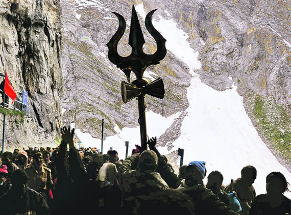 There is a sea of humanity inside the holy cave paying obeisance to Lord Shiva