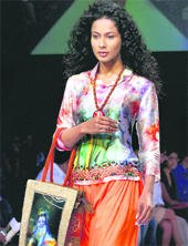 A Model displays the collection of designer Shagufta Quamar during the Lakme Fashion Week in Mumbai on Sunday. 