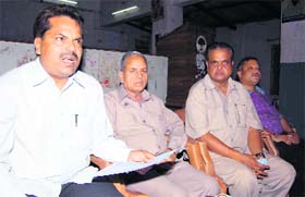 RP Singh (left), national president of the Aarakshan Bachao Sangharash Samiti, at a press conference in Dehradun on Sunday