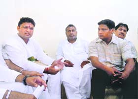 MP Ashok Tanwar (left) speaks to mediapersons at Fatehabad on Sunday