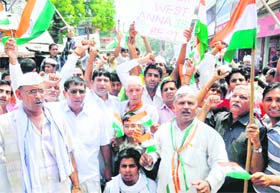 Supporters of Anna Hazare protest against corruption in Faridabad on Sunday