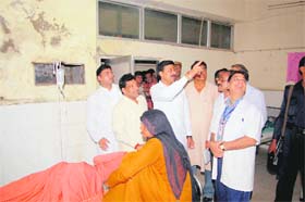 Health Minister Rao Narender Singh shows poor sanitary conditions in the General Hospital, Sirsa, to doctors on Sunday