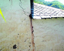 Cracks have appeared in many houses like this one in the Sanskran panchayat in the Dharampur area in Mandi