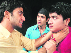 A scene from the play, Topian, staged at the Natrang Studio Theatre in Jammu on Sunday.