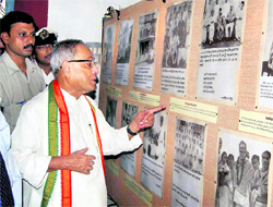 Union Finance Minister Pranab Mukherjee admire photographs after inaugurating the students centre for creative Expression at BESU (Bengal Engineering & Science University) in Howrah on Sunday