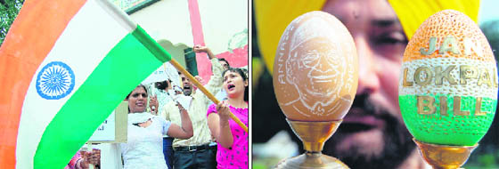 Members of the Radiance Manch, a theatre group, hold a march in support of Anna Hazares movement against corruption, and (right) artist Harwinder Singh Gill portraits Anna Hazare and the Jan Lok Bill on two egg shells in Amritsar on Monday