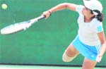 Ayushi Gupta plays a shot in her girls under-14 match against Saryana Khanna during the CLTA-AITA Talent Series Tennis Tournament at Sector 10 of Chandigarh