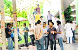 Instead of the usual crowd associated with campaigning on the Panjab University campus, students of DAV College engage in personal discussions to impress voters for elections within the corridors of DAV College at Sector 10 in Chandigarh