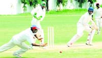 Himanshu Chawla of IS Bindras XI plays a shot through the covers during the match against Navjot Singh Sidhus XI at the Government Model School cricket ground in Sector 26 of Chandigarh 