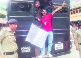 The police rounds up Congress workers who staged a protest against the state government during a visit of Chief Minister Ramesh Pokhriyal Nishank to Bhawali, near Nainital, on Monday