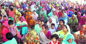 Women attend a free medical camp organised by the Chaupal at Bhainswal Kalan village in Sonepat. 