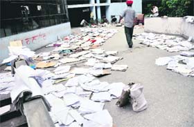 Documents belonging to the police department being dried in the open at the Mini-Secretariat in Ludhiana