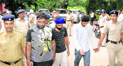 The vehicle theft accused in police custody on Tuesday.