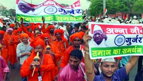 Gujjars support the anti-corruption campaign at the Ramlila Ground in New Delhi on Tuesday.