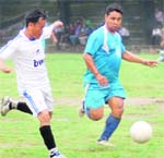 Players in action in a match in the Lala Nemi Dass Memorial District Football League in Dehradun