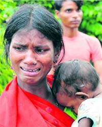 Inconsolable Bharti Devi, who lost her husband in a cracker factory explosion in Mougal Majra village on Monday.