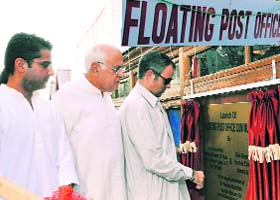 Chief Minister Omar Abdullah inaugurates the floating post office-cum-museum on the Dal Lake in Srinagar