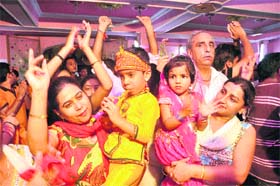 Devotees take part in the Janmashtami celebrations at ISKON Temple in Jammu