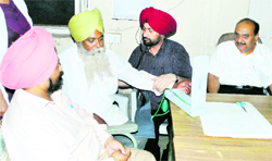 A doctor checks up an old patient at the newly opened geriatric clinic at Government Rajindra Hospital in Patiala on Tuesday