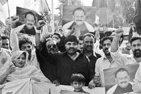 Activists from the Muttahida Qaumi Movement protest against the recent violence and killings in Karachi, in Islamabad on Tuesday