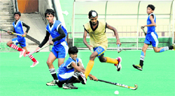 A match in progress during the 10th ONGC SN Vohra Memorial Hockey Tournament in Chandigarh on Wednesday