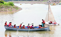 NCC cadets practise rowing for undertaking an expedition in the Gobind Sagar Lake in Himachal Pradesh, at the Sukhna Lake in Chandigarh on Wednesday
