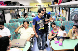 Thrilled passengers in Duronto Express on their journey to Amritsar on Wednesday evening