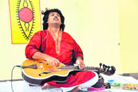 Salil Mohan Bhatt gives a performance at Doon University in Dehradun on Wednesday.