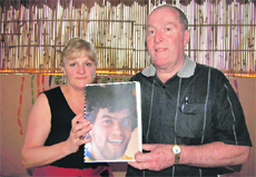 Jock Chambers and Dianne, parents of Ryan, with his photograph in Dehradun on Wednesday.