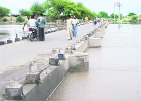 The rising flood water has touched the concrete bridge in Fazilka. The bridge is the only link with the town for residents of at least eight villages