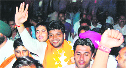 Former District Youth Congress president Dinesh Bassi being greeted by supporters after his release from the Central Jail in Amritsar on Thursday. 