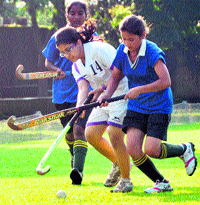 A match in progress in the Major Dhyan Chand Memorial Inter-school Girls Tournament in Dehradun on Thursday