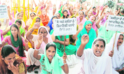 Members of the Punjab Christian Movement hold a protest in Jalandhar on Thursday