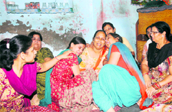 Wailing relatives of Nitin at Lawan Mohalla in Jalandhar on Thursday