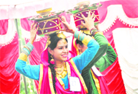 Students of Arya College take part in Miss Teej contest in Ludhiana. 