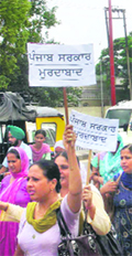 Rural Health Mission staff during a protest in Patiala on Thursday