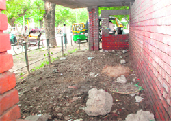 A bus queue shelter in a state of neglect at the Phase II market in Mohali. Residents repeated pleas have fallen on deaf ears