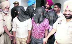 The CIA staff of the Jalandhar (rural) police parades members of the gang arrested on Friday in Jalandhar. 
