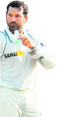 Sachin Tendulkar enjoys an energy drink