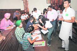 INSO activists campaign in classrooms to seek votes. Tribune photo: Manoj Mahajan