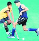 Players fight for the ball during the final match of the ONGC SN Vohra Memorial Hockey Tournament in Chandigarh