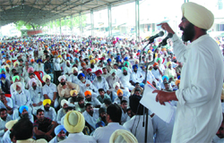 PPP leader Manpreet Badal addresses a rally in support of Gobindpura farmers whose land has allegedly been acquired forcibly by the state government, in Bareta on Saturday