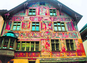 The Haus zum Ritter is covered in the most striking frescoes