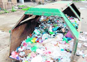Flouting Norms: Biomedical waste lies scattered at a garbage dump in the Civil Hospital in Amritsar on Sunday