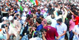 A large number of Anna Hazares supporters at the Ramlila Maidan in New Delhi on Sunday.
