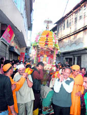 Krishna devotees take out a procession in Mussoorie on Sunday.