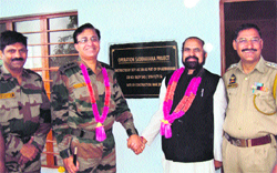 MLA Chenani, KC Bhagat with Commanding Officer, Dhruva MT Batallion, Col Munish Gupta after inaugurating a community hall at Panchari village in Udhanpur district on Saturday