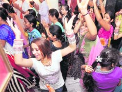 Devotees celebrate Janmashtami at ISKCON Temple in Ludhiana. 